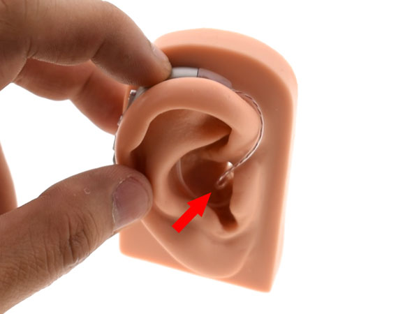 The rubber ear dome tip needs to seal the ear canal in order to prevent feedback noises. 